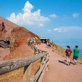 Luxury Mercedes passenger van driving tourists to Mount Vesuvius crater